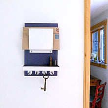 Load image into Gallery viewer, Navy blue mail holder mounted on the wall.